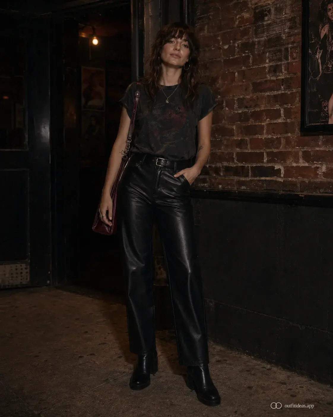 Indie concert outfit with vintage tee, faux leather trouser and block boot